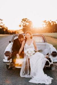 W+R 12-08-23 Th3rd Dimension Media WR-809 Professional videography, photography, and drone footage capture bridal couple on a country road at sunset.