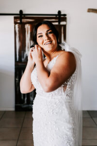 Professional videography photography bride getting ready indoors