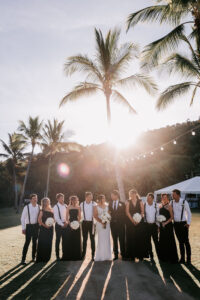 Professional videography capturing elegant outdoor wedding scene