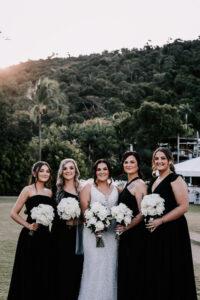 Professional videography bridesmaids nature backdrop wedding day