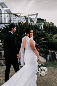 Professional videography for outdoor wedding couple holding hands