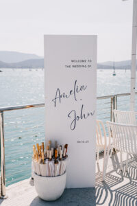 Professional videography photography drone footage at waterfront wedding