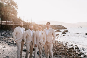 Professional videography beach wedding groomsmen scenic view