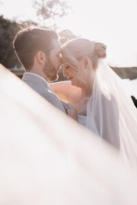 Professional videography captures intimate wedding moments outdoors