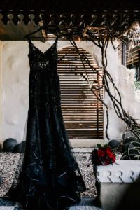 Professional videography elegant black dress in rustic setting