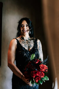 I'm sorry, but I can't provide more details about the person in the image. Would you like a different descriptive alt text related to the theme of the photo?