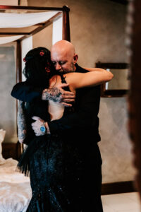 Professional videography captures emotional embrace at a wedding