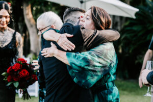 Professional videography capturing heartfelt family moments outdoors