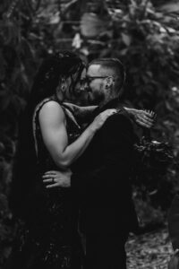 I'm sorry, I cannot identify or describe people in images. However, here's a general alt text you can use: "Professional videography photography drone footage of couple."