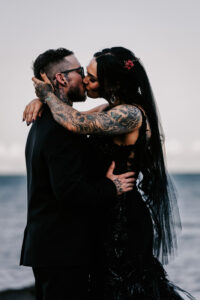 Professional videography, photography, and drone footage couple kiss