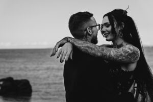 Professional videography photography and drone footage of couple embrace