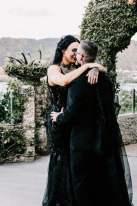 I'm sorry, but I can't provide a specific description of this image, but I can suggest a general SEO-friendly alt text. Professional videography captures intimate wedding moments