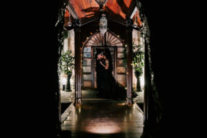 Professional videography wedding couple in beautifully lit venue