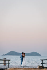 Professional videography, photography, couple embracing at sunset