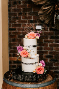 Professional videography, photography, drone footage of wedding cake