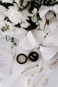 Professional videography captures elegant wedding accessories scene