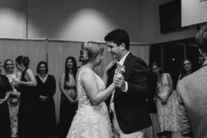 Professional videography capturing joyful wedding first dance moment