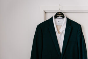 Professional videography photography and drone footage suit on hanger