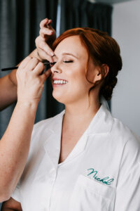 Professional videography showcasing a makeup artist at work