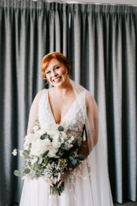 Professional videography photography and drone footage bridal smile