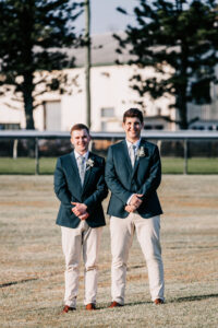 Professional videography capturing two smiling men outdoors