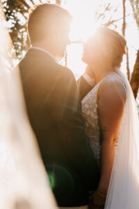 Professional videography, photography, and drone footage capturing couple's romantic sunset moment