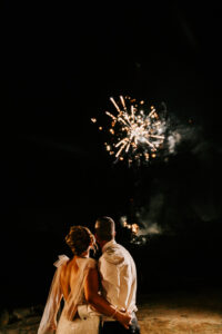 Professional videography wedding couple watching fireworks display