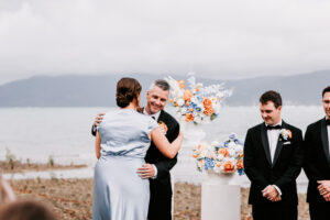 Professional videography capturing a wedding ceremony by the sea