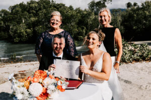 Professional videography capturing couples wedding joy outdoors