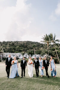 Professional videography of elegant wedding party on lush grounds