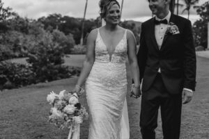 Professional videography of a wedding couple walking outdoors