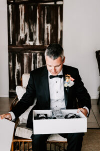 Professional videography wedding preparation elegant groom suit