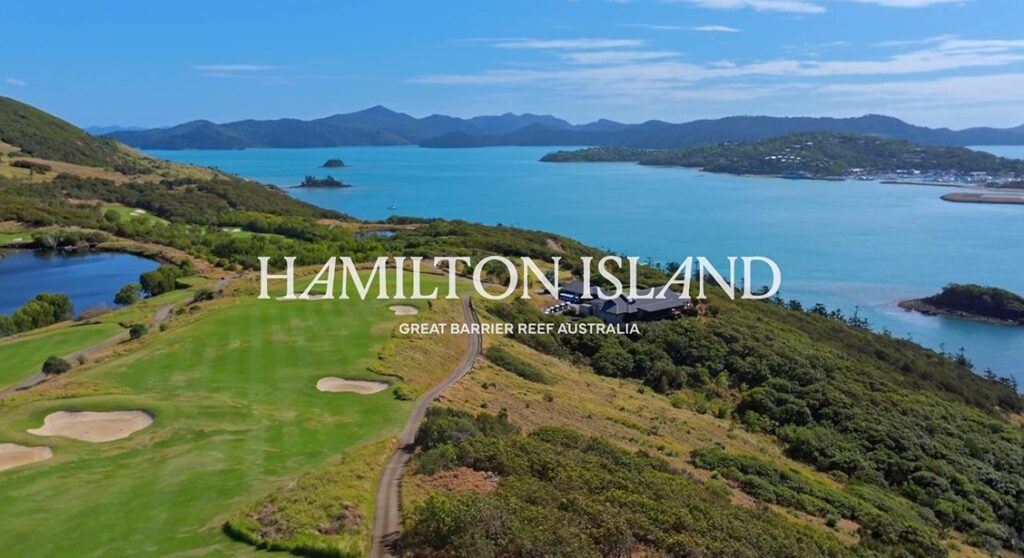 Aerial video still showing Dent Island and surrounding Whitsunday waters from TDM’s proposed wellness-centre site inspection
