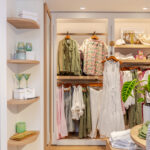 Professional videography clothing store with stylish wardrobe setup