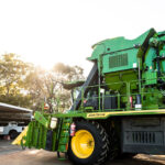 Professional videography capturing green agricultural machinery