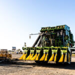 Professional videography showcasing crop harvesting machinery