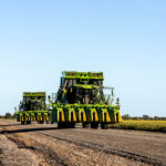 Professional videography agriculture machinery on a rural road