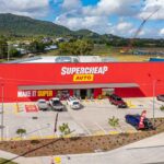 Professional videography photography drone shot of auto store