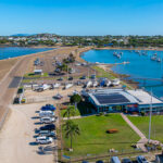 Professional videography showcasing marina with boats and coast