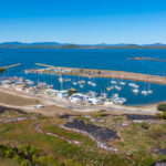 Professional videography of marina aerial view on sunny day