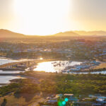 Professional videography showcasing sunset aerial cityscape view