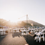 Professional videography outdoor event setup with mountain views