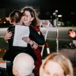 Professional videography capturing a heartfelt outdoor celebration