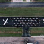 Professional videography and drone footage of airplane runway