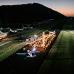 Professional videography capturing a scenic airport at sunset