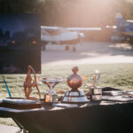 Professional videography awards showcased outdoors on a table