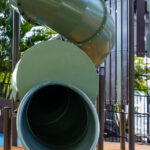 Professional videography playful playground slide perspective shot