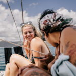 Professional videography capturing joyful people on a boat