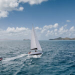 Professional videography photography and drone footage of sailboat