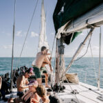 Professional videography and photography of people on a sailboat